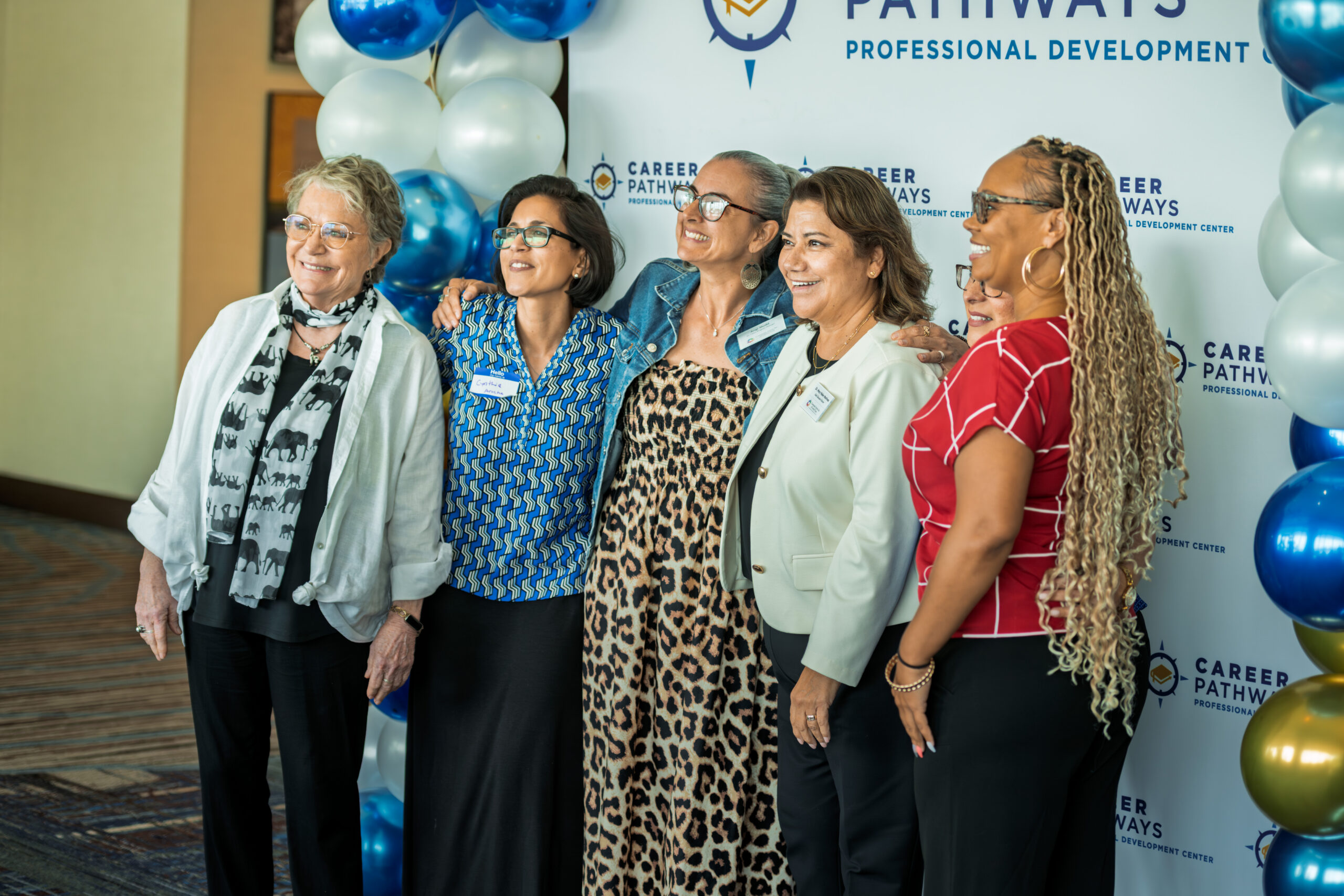 Group photo at the CPPDC step-and-repeat banner at the Career Pathways Symposium
